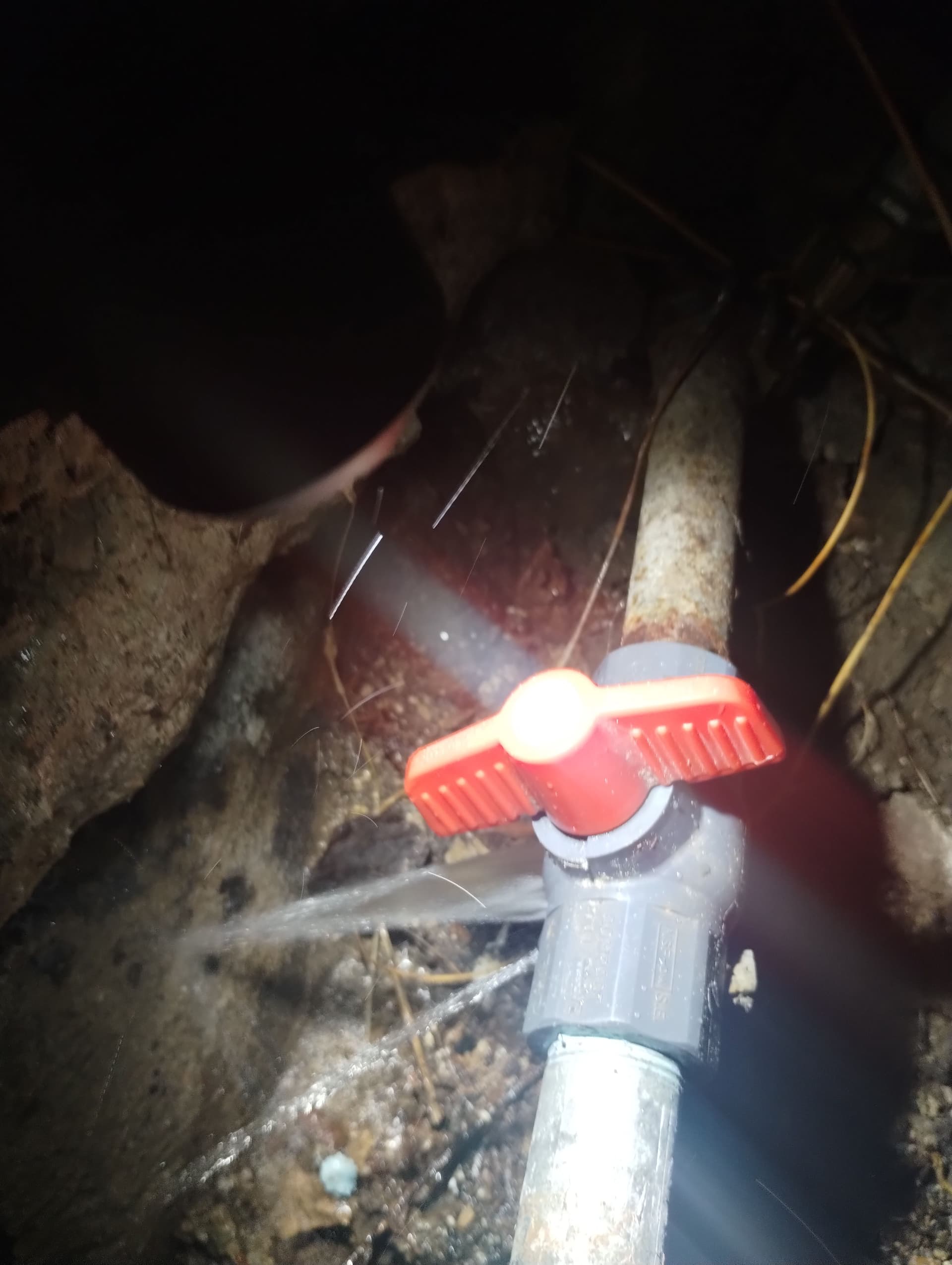 Cracked Main Shutoff Valve Replaced With New Brass Ball Valve image